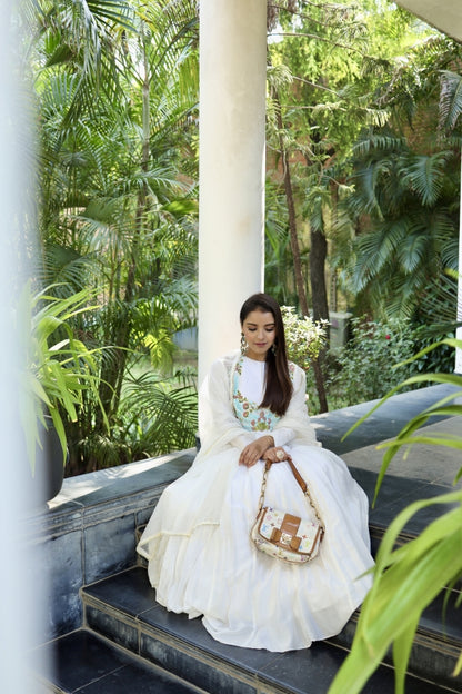 An off white Anarkali